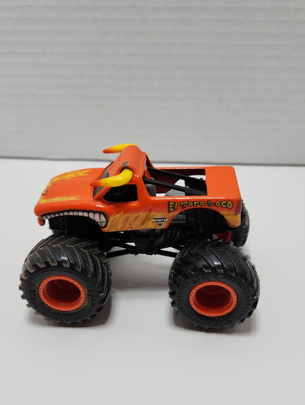 El Toro Loco Orange Monster Truck Toy